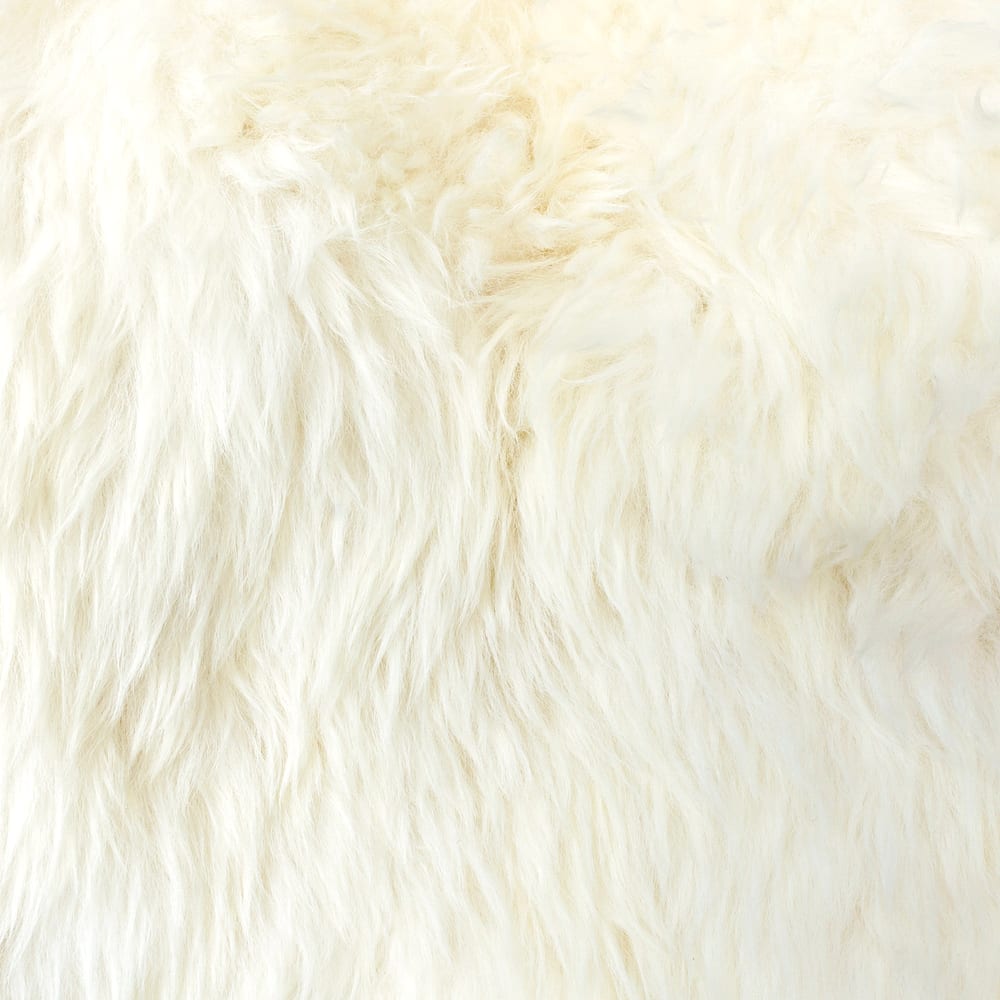 Close view of real sheepskin rug wool texture and natural variation